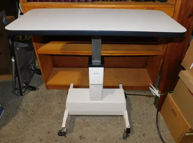 Table de levage motorisée pour optométrie