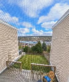 Beautiful Fully-Furnished 2-Bedroom Downtown Home | Rear Deck a - Photo 8