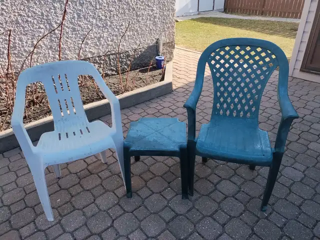 plastic lawn chairs and table
