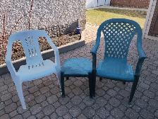 plastic lawn chairs and table