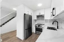 FULLY RENOVATED 4 bedroom corner unit - 350 CLAREVIEW RD NW - Photo 3