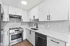 FULLY RENOVATED 4 bedroom corner unit - 350 CLAREVIEW RD NW - Photo 4