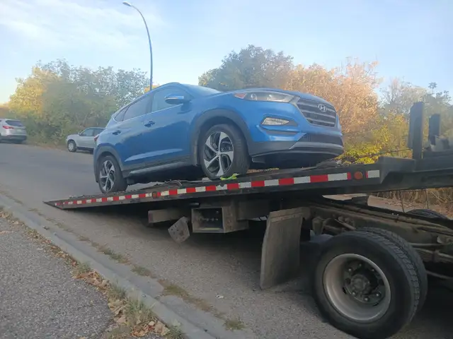 Calgary Towing service @ 587-830-2348
