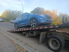 Calgary Towing service @ 587-830-2348