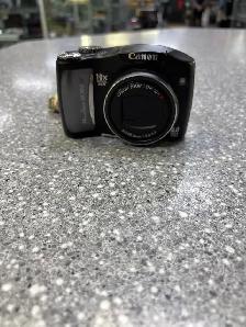 Canon SX100 IS 8MP Digital Camera With Bag