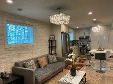 Fully renovated and furnished 2 bdr sep entr & laundry bsm suite
