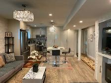Fully renovated and furnished 2 bdr sep entr & laundry bsm suite - Photo 2