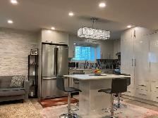 Fully renovated and furnished 2 bdr sep entr & laundry bsm suite - Photo 4