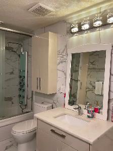 Fully renovated and furnished 2 bdr sep entr & laundry bsm suite - Photo 10