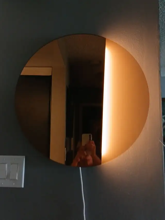 Round wall mirror