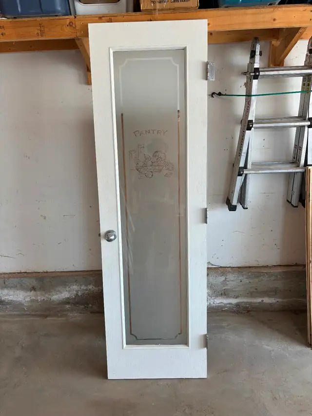 Pantry door for sale (24"x80") Solid oak under the white paint