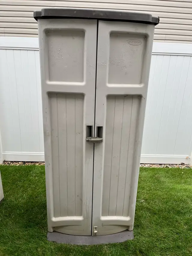 two Vinyl outdoor garden and tool sheds $100 each