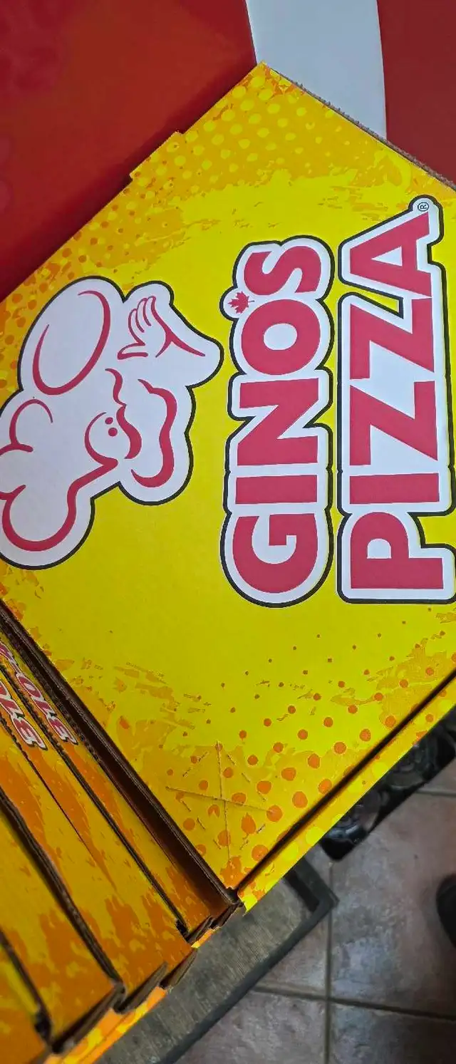 Cashier and helper at pizza store