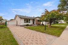 SIX BEDROOMS. 200 AMP. SIDE ENTRANCE. DOUBLE GARAGE. GARDEN CITY
