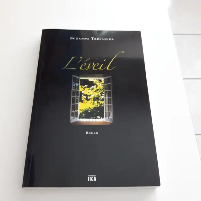 BON ROMAN NEUF DE SUZANNE TRÉPANNIER L'ÉVEIL DE 393 PAGES: $5.00