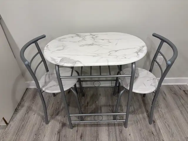 Small table with two matching chairs