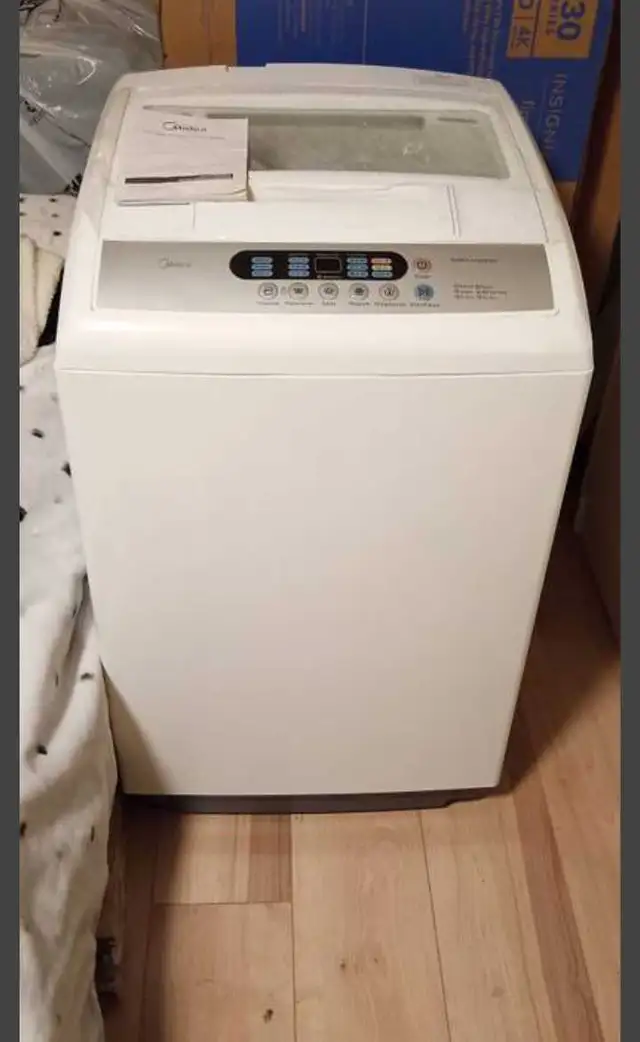 Laundry washer, brand new.