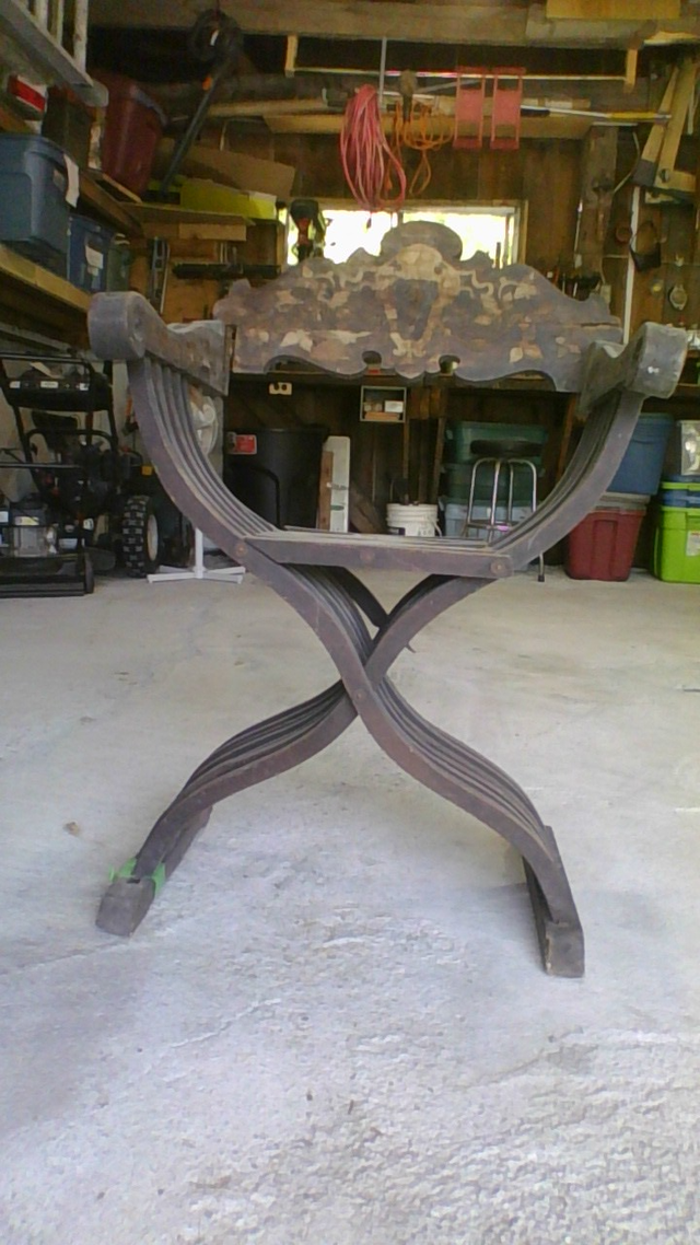 Very old  Savonarola walnut European arm chair.