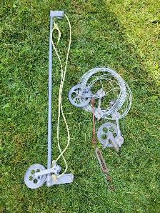clothesline cable, pulleys and elevator