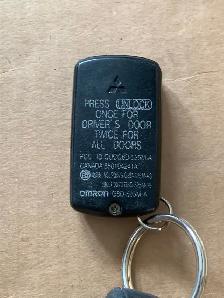MITSUBISHI 2 buttons keyless remote key FOB transmitter OUCG8D-5 - Photo 2