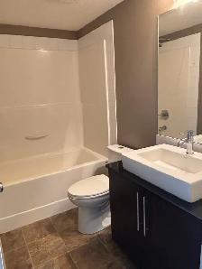 Executive Top floor 2 bedroom 1 bathroom Skyview condo NE - Photo 4