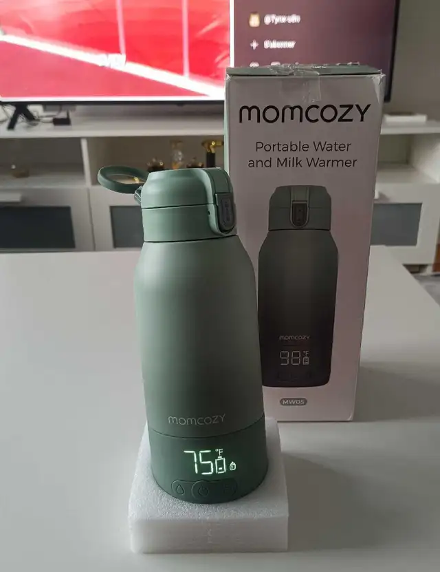 New portable water and milk warmer momcozy