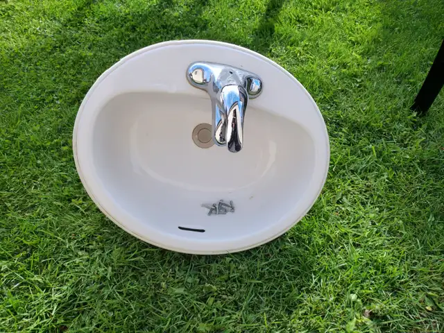 bathroom sink and taps