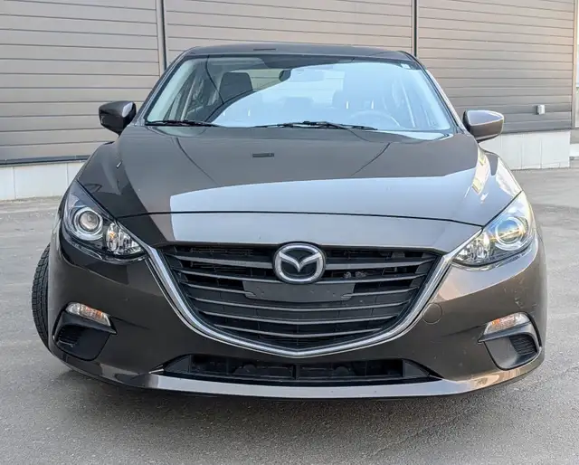 2015 Mazda 3    $14,700