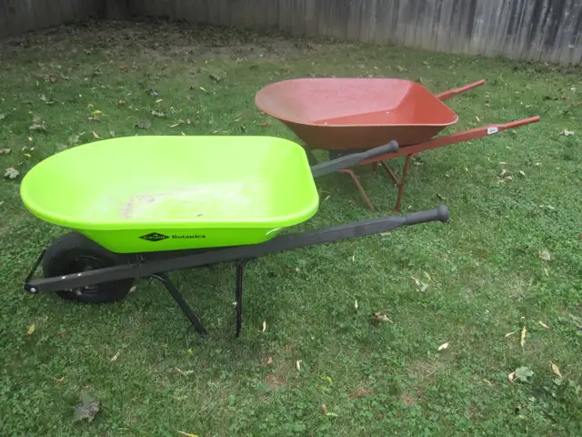 LIKE NEW WHEELBARROWS ONE STEEL & ONE PLASTIC