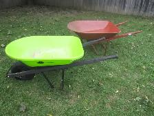 LIKE NEW WHEELBARROWS ONE STEEL & ONE PLASTIC