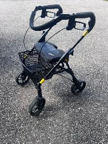 Walker w hand brake, seat and basket