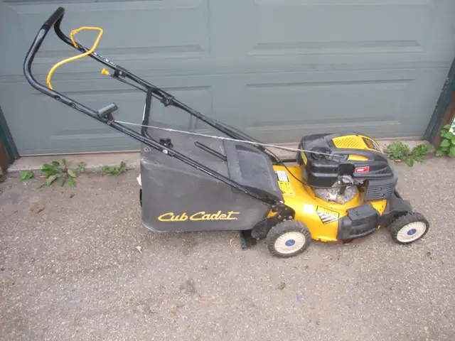 CUB CADET LAWN MOWER FOR PARTS OR REPAIR HOLE IN DECK