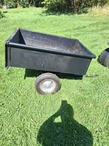 Dumping utility cart for ride on lawn mower