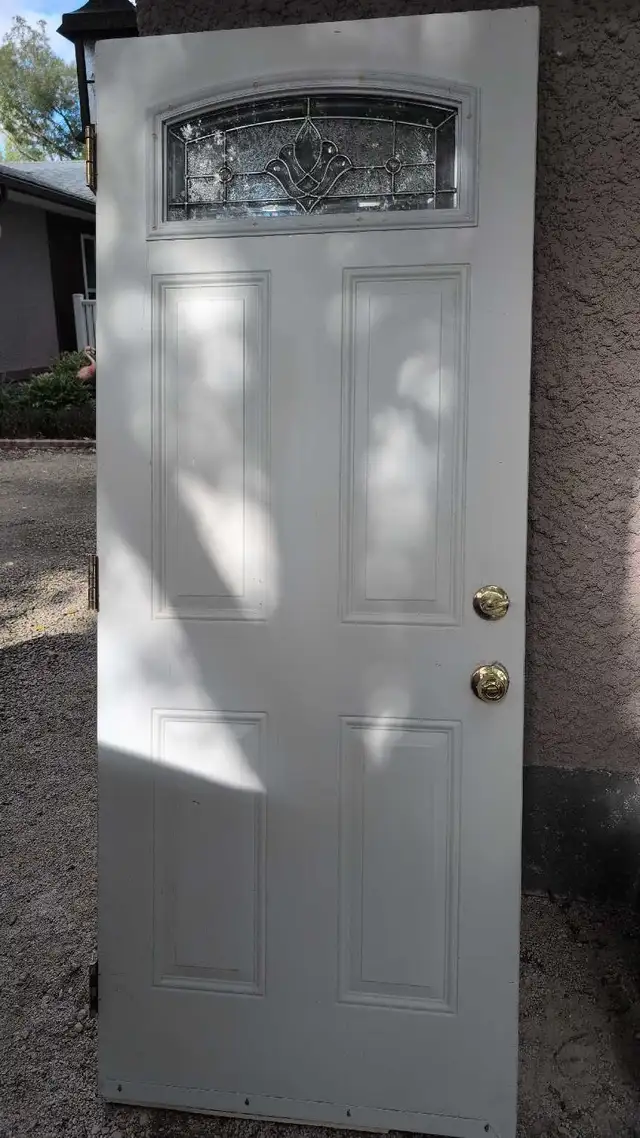 32'x79' steel insulated door with window