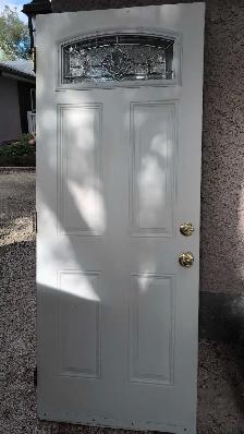 32'x79' steel insulated door with window