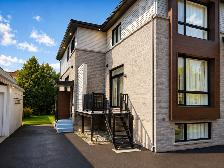 A LARGE TOWNHOUSE IN ST-HUBERT IS NOW FOR RENT! - Photo 2