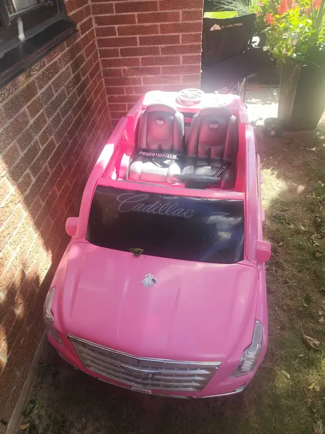Barbie 2 seater ride on car with radio