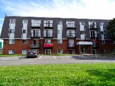 UN 3½ POUR 1 OCTOBRE AU 770 CONTENT DEMIS SOUS-SOL PORTE PATIOS