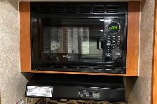 2015 Adventurer Eagle Cap M1165 – Pre-Owned Triple Slide Camper. - Photo 24