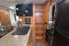 2015 Adventurer Eagle Cap M1165 – Pre-Owned Triple Slide Camper. - Photo 29