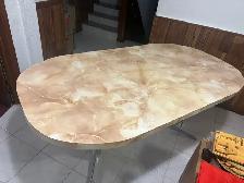 Free delivery used Oval dining table with marble-look finish