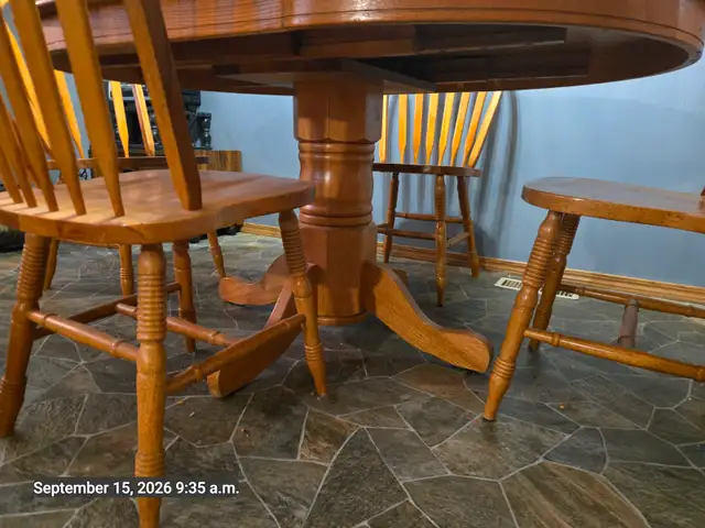 solid oak table and 4 chairs