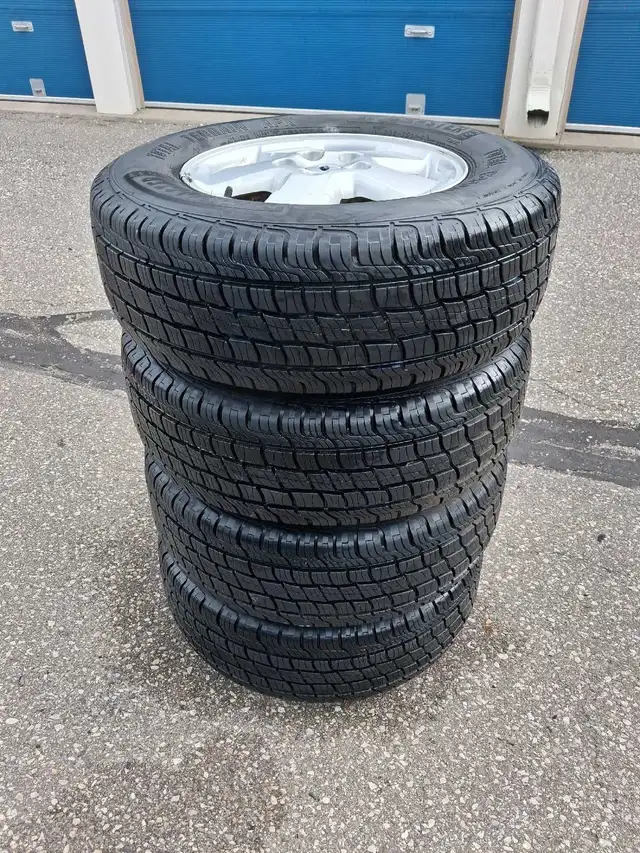 235/70/r16 tires with rims $580