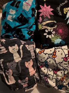 Assorted  scrub tops with matching pants - Photo 2