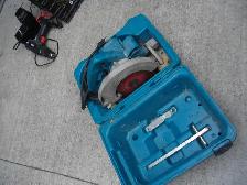MAKITA SKILL SAW WITH 2 NEW BLADES