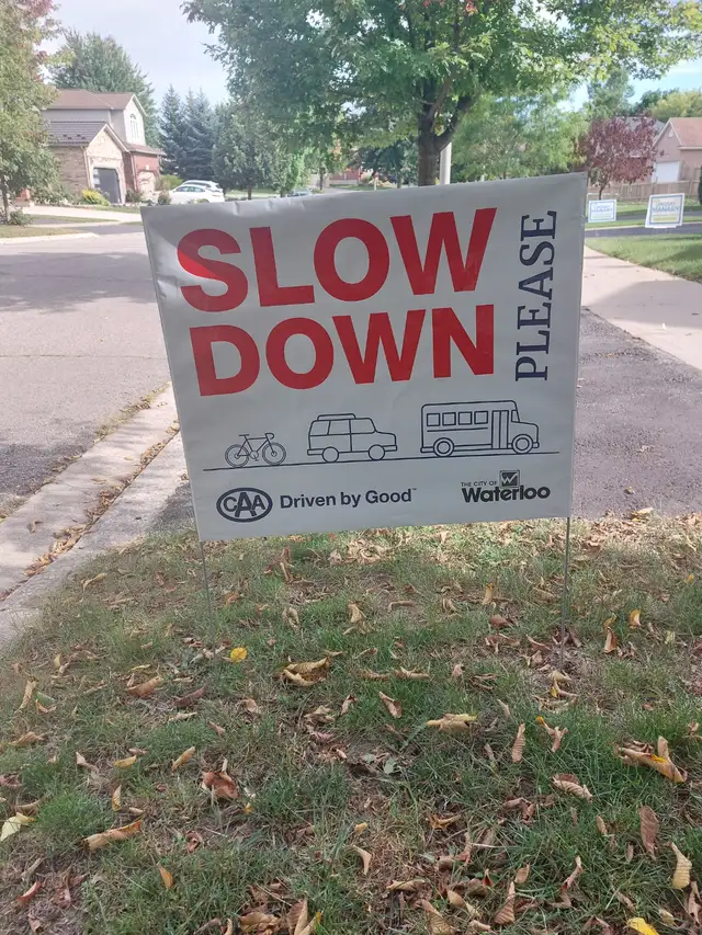 SLOW DOWN SIGNS