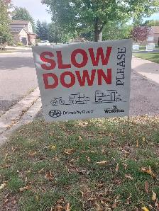 SLOW DOWN SIGNS