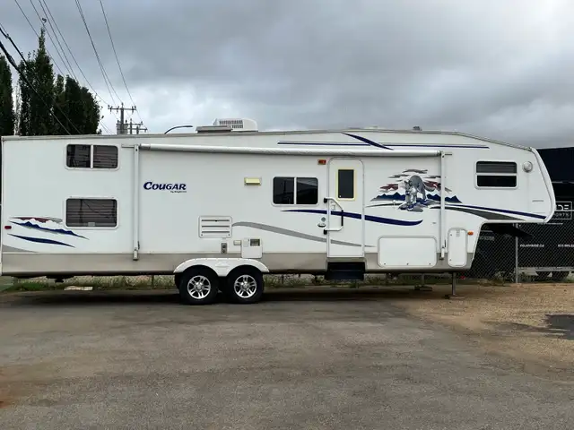 35’ Keystone Cougar fifth Wheel, quad bunk Polar Package