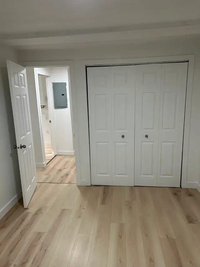 Large 4 1/2 renovated, hot water included West Island NEAR ALL