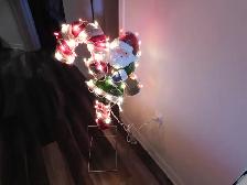 Santa Clause on its own stand with Lights . Christmas Decoration